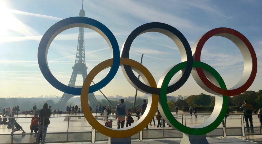 Paris 2024 Olympics. The Olympic rings ower backdrop