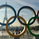 Paris 2024 Olympics. The Olympic rings ower backdrop