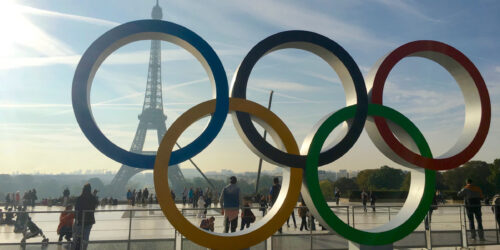 Paris 2024 Olympics. The Olympic rings ower backdrop